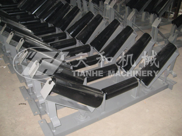 Carrier taper self-aligning idler